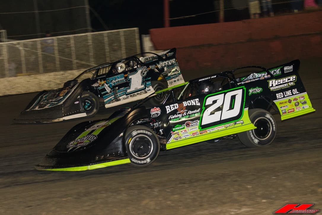 Warrior House Car #1G side by side with the #20 under the lights